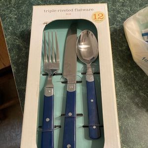 New in box Martha Stewart silverware setting with blue grips